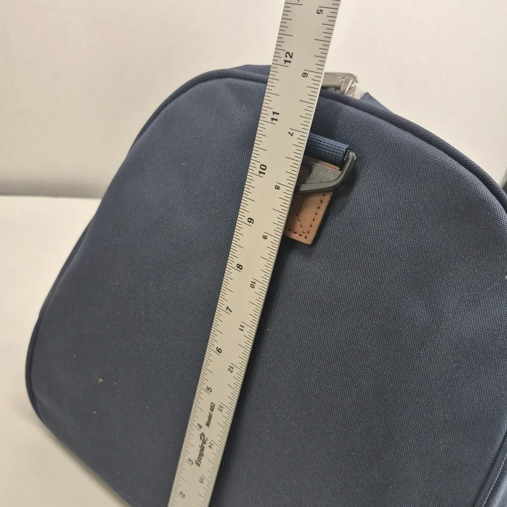 Herschel Novel Duffle Bag Navy Tan Retail: $120
